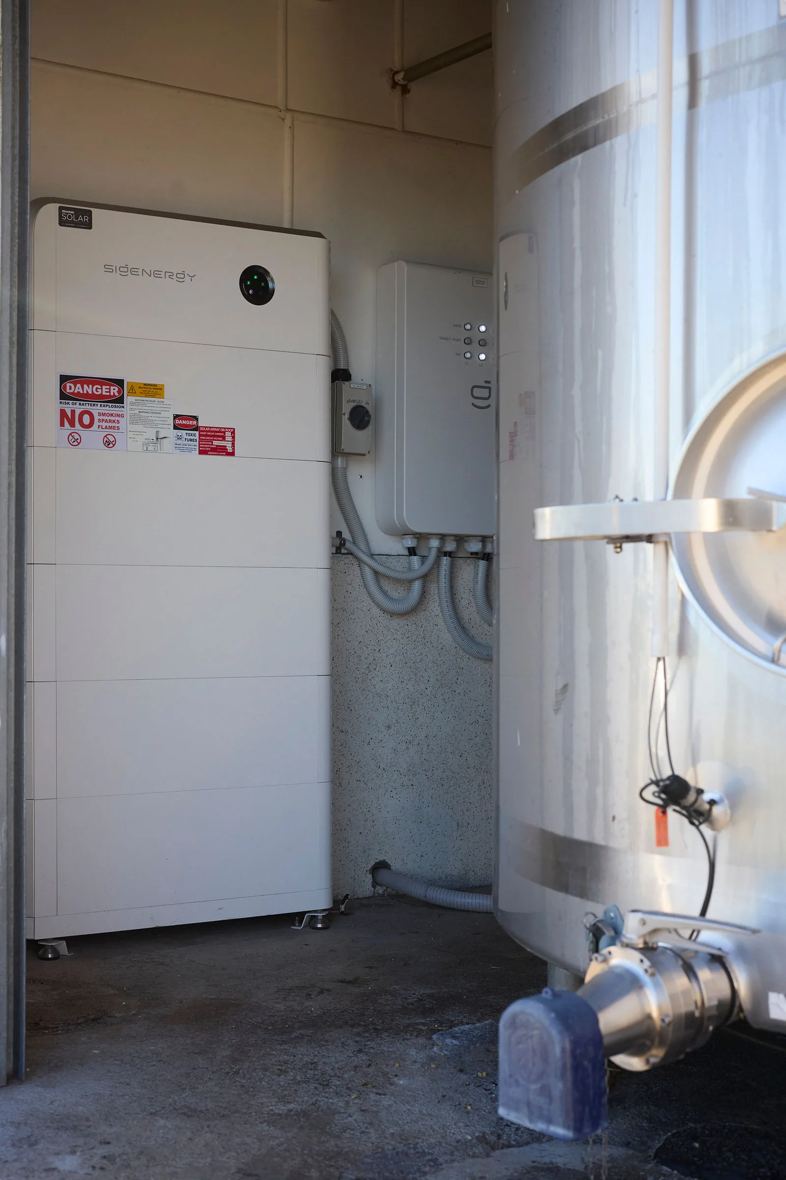 Sigenergy battery installed beside a milk vat on a Taranaki dairy farm