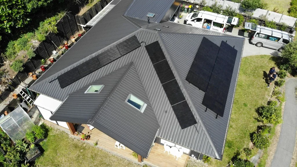 Drone view of a residential roof with a 20-panel solar array in Taranaki